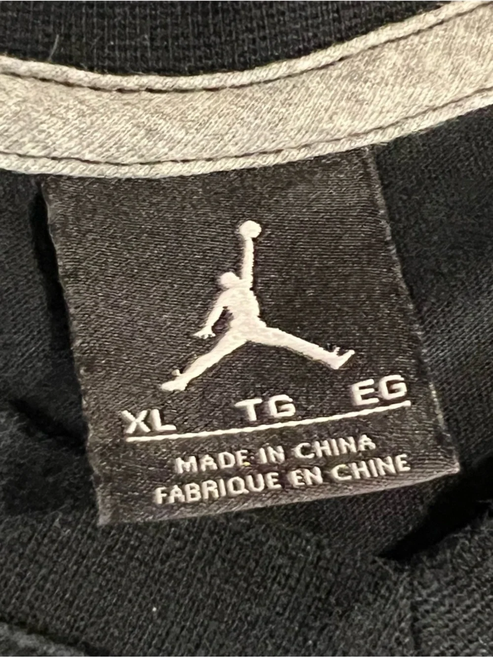 Jordan Men's Black Short Sleeve V-Neck Tee with Red Jumpman and Gray Accent - Picture 8 of 8